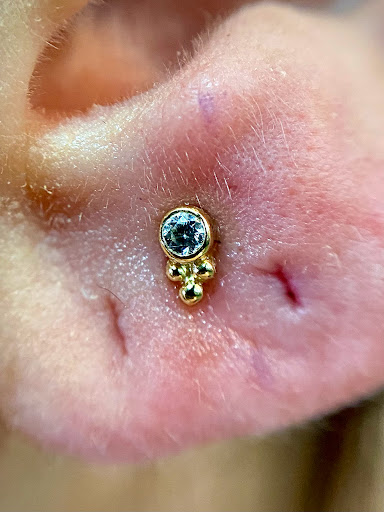 Explore lfc tattoo ideas, creative tattoo ideas in Orange, available at Symbiosis Body Piercing