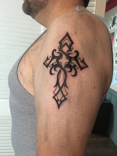Explore back of head tattoo ideas, creative tattoo ideas in Kingsford, available at Deft Tattoo Studio