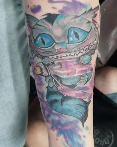 Explore cool face tattoo ideas, creative tattoo ideas in Albuquerque, available at A Touch of Ink Tattoo & Art Gallery