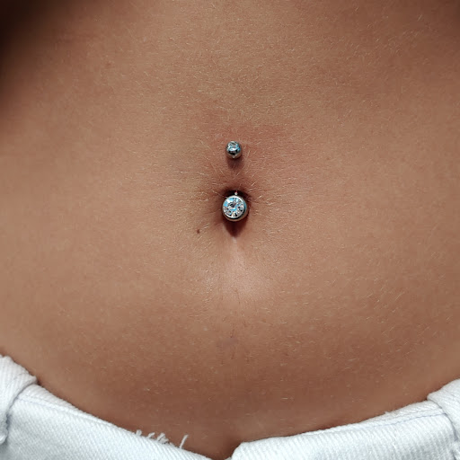 Explore feminine foot tattoo ideas, creative tattoo ideas in San Marcos, available at Ollie the Impaler Body Piercing