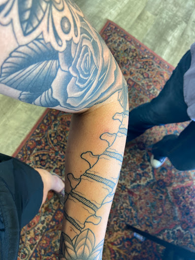 Explore knee ditch tattoo ideas, creative tattoo ideas in Kansas City, available at Revelation Tattoo