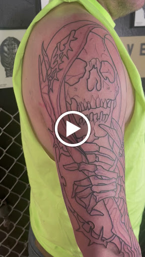 Explore neck tattoos ideas male, creative tattoo ideas in Buffalo, available at True Gloom Tattoo Studio