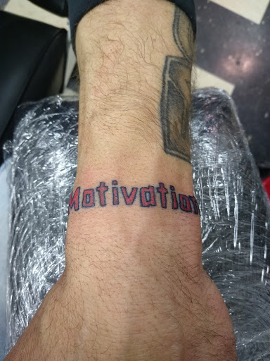 Explore cosmos flower tattoo ideas, creative tattoo ideas in Owosso, available at Twisted ink tattoo