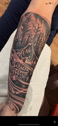 Explore child tattoo ideas, creative tattoo ideas in Athol, available at Ragnark Tattoo Company