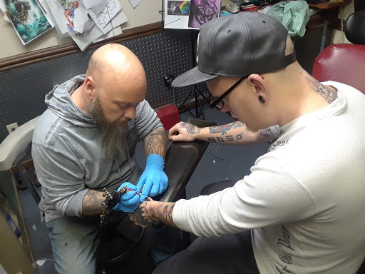 Explore tattoo ideas arm male, creative tattoo ideas in Sandusky, available at Atomik Tattoos