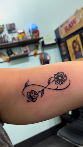Explore cancer tattoo ideas for guys, creative tattoo ideas in Destin, available at Atomic Frog Tattoo