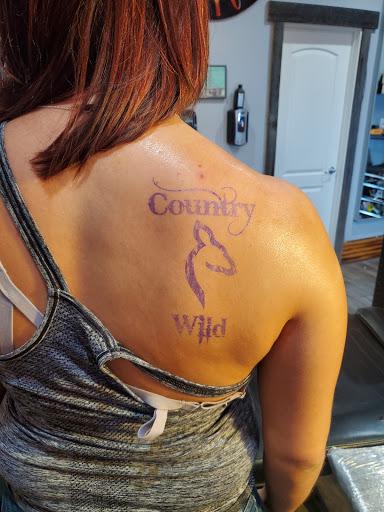 Explore february birth flower tattoo ideas, creative tattoo ideas in Harrison, available at BROKEN NEEDLE TATTOO