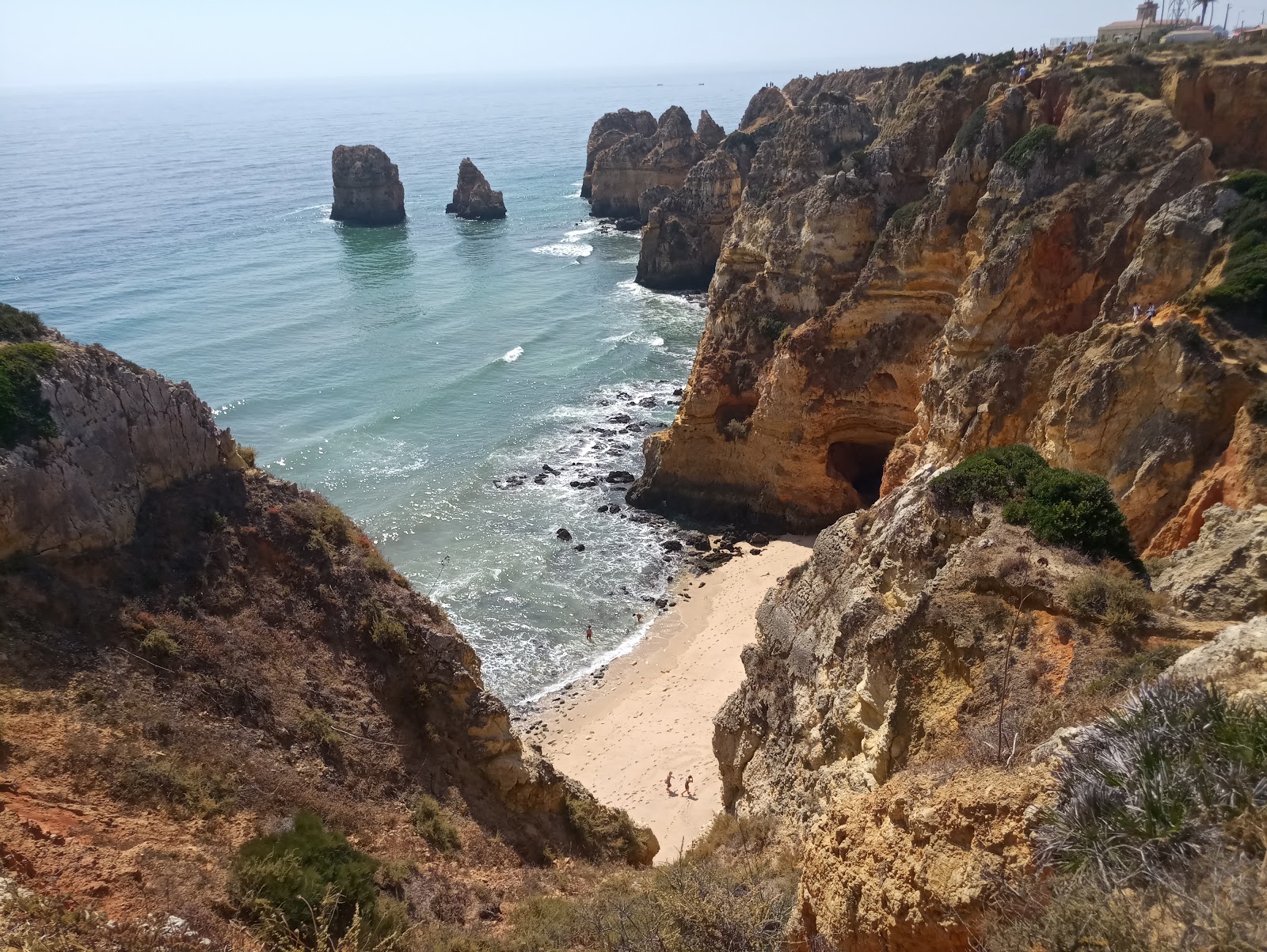 Zdjęcie Praia da Balanca z powierzchnią drobny beżowy piasek