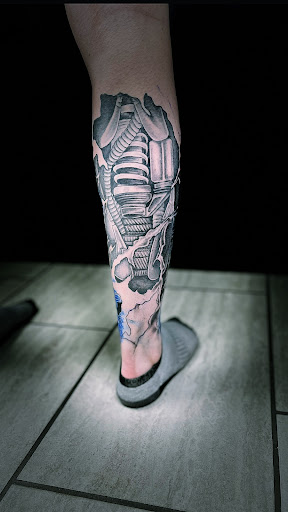 Explore tattoo ideas ribs, creative tattoo ideas in Cadillac, available at Limitless Ink Tattoo Studio