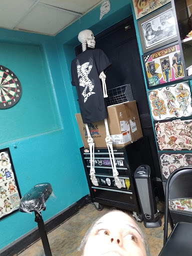 Tattoo Shop «Defiance Tattoos», reviews and photos, 163 E Main St, Kent, OH 44240, USA