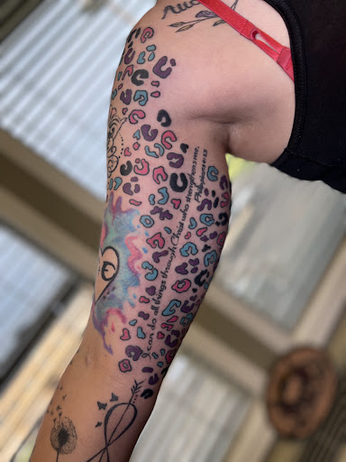 Explore hair stylist tattoo ideas, creative tattoo ideas in Watford City, available at Soulful Ink Studios