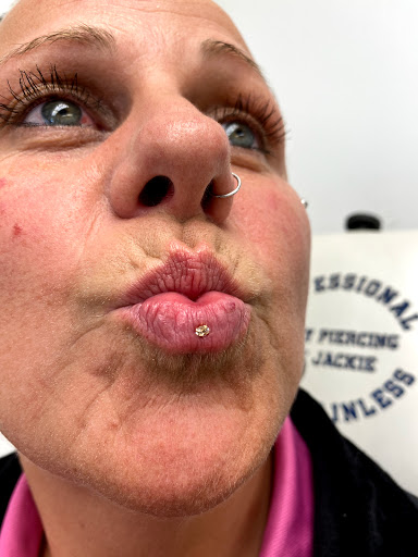 Explore trust no one tattoo ideas, creative tattoo ideas in Myrtle Beach, available at Professional Body Piercing by Jackie