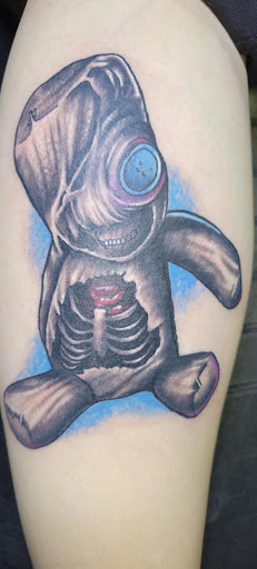 Explore cookie monster tattoo ideas, creative tattoo ideas in Angola, available at Hoodlum Ink