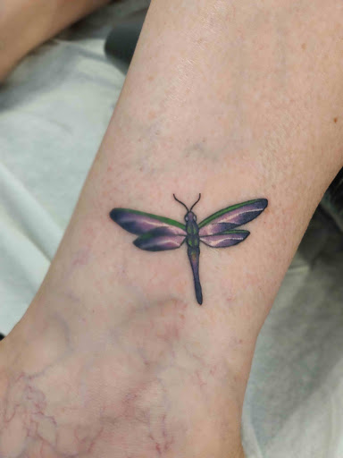 Explore tattoo ideas in french, creative tattoo ideas in Hebron, available at Explosive Ink Tattoo