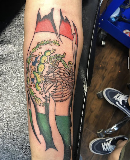 Explore rip tattoo ideas small, creative tattoo ideas in Alamosa, available at The Shop Tattoo & Comics