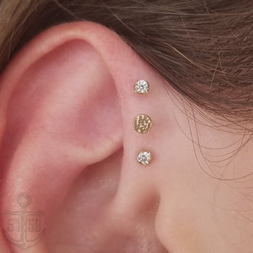 Explore great chest tattoo ideas, creative tattoo ideas in Kearney, available at Studio 5150 Piercing & Fine Jewelry