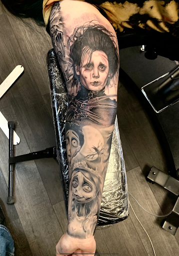 Explore mens angel tattoo ideas, creative tattoo ideas in Silver City, available at Independent Ink Tattoo