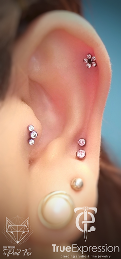 Explore poker tattoo ideas, creative tattoo ideas in Elmhurst, available at TRUE EXPRESSION - Fine Piercing Studio