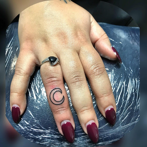 Find family of 4 tattoo ideas for your next unique tattoo in Barberton at Magic City Tattoo Company