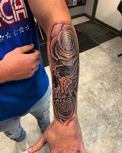 Explore lung cancer ribbon tattoo ideas, creative tattoo ideas in Hudson Falls, available at ALTERED ADDICTION TATTOOS