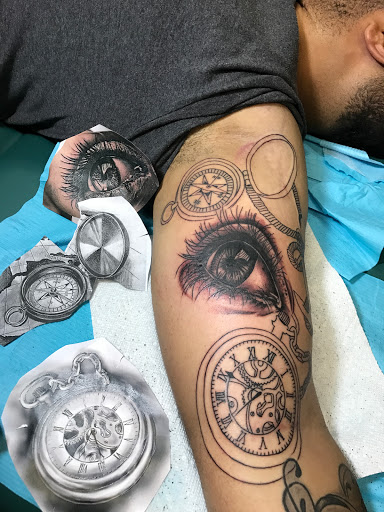 Explore atom tattoo ideas, creative tattoo ideas in Plainfield, available at Dark Souls Ink 2