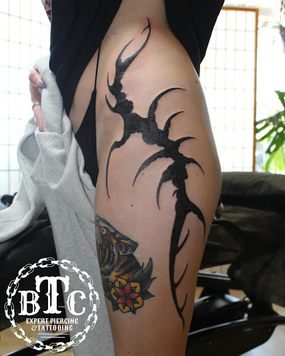 Explore tattoo roman numerals ideas, creative tattoo ideas in Payette, available at Boomerang Tattoo Company