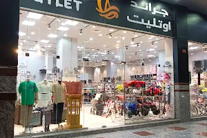 Grand Outlet Garments and Shoes trading image