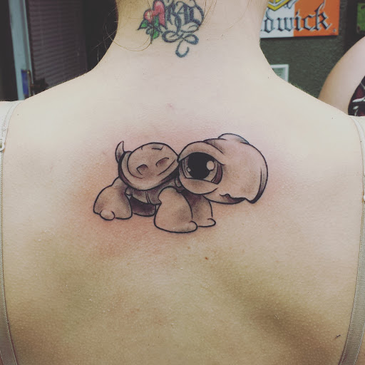 Explore acoustic guitar tattoo ideas, creative tattoo ideas in Salem, available at Addictions BodyArt Body Piercing & Tattoo