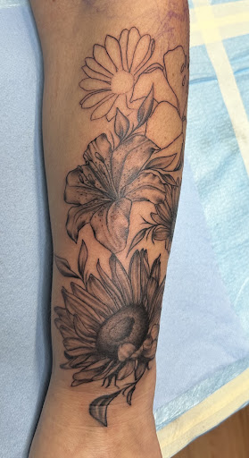 Explore men's forearm tattoo ideas, creative tattoo ideas in Shelbyville, available at Ink & Skin Studios Inc