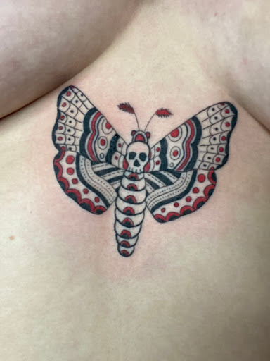 Explore dark feminine tattoo ideas, creative tattoo ideas in Houston, available at Vibes Tattoo Studio Houston