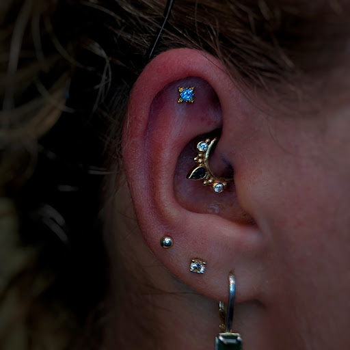 Explore roman tattoo ideas, creative tattoo ideas in Coeur D Alene, available at Relic Moon Fine Jewelry & Body Piercing