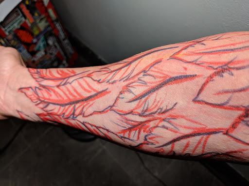 Explore violet tattoo ideas, creative tattoo ideas in Bay City, available at Electric Chair Tattoo