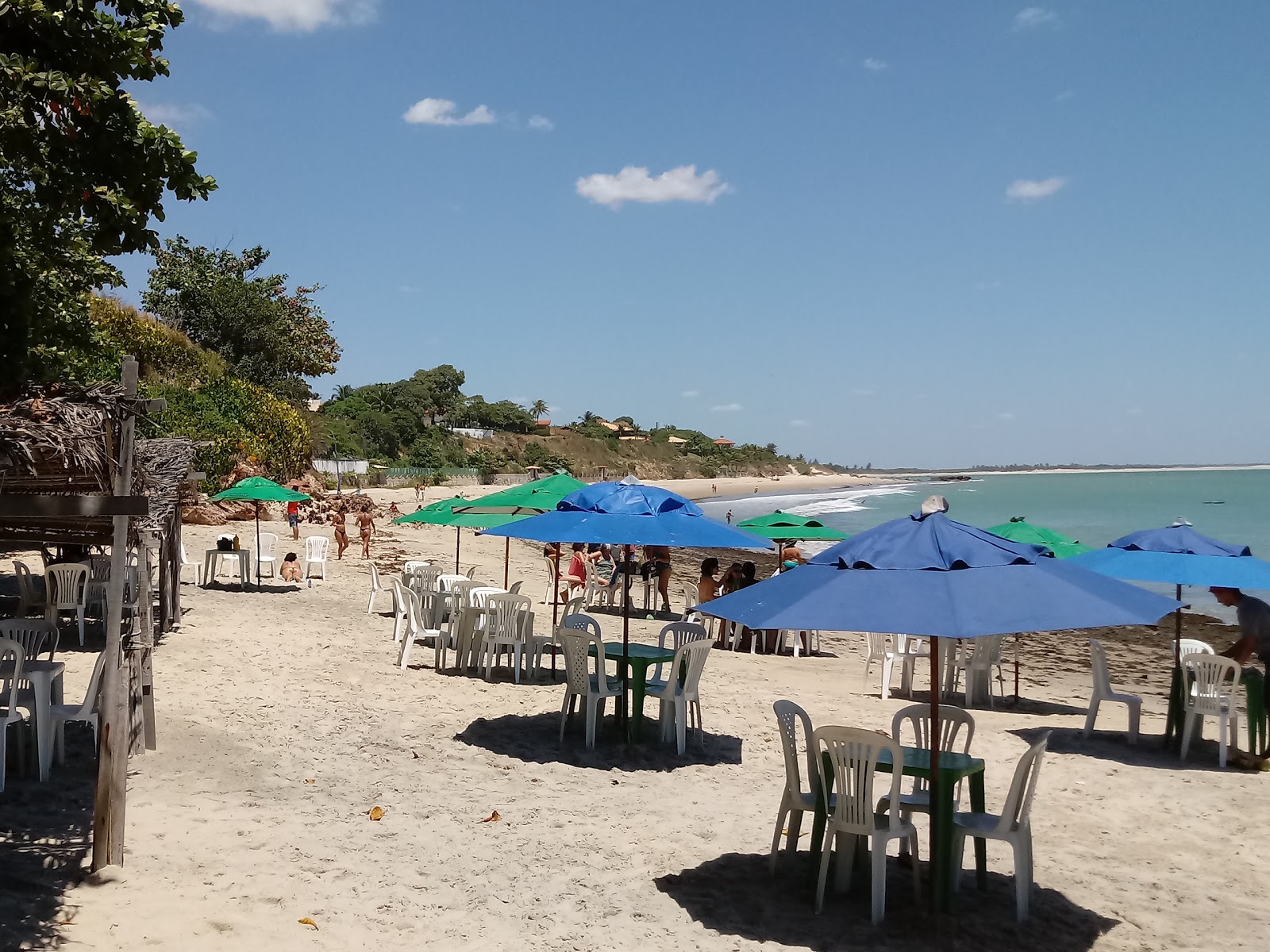 Foto van Praia da Bica met turquoise puur water oppervlakte