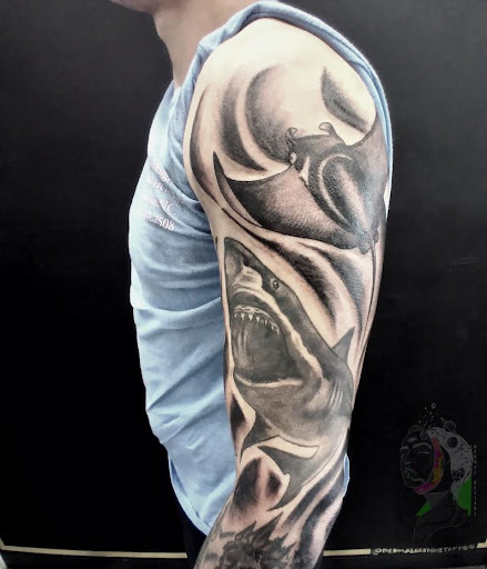 Explore women's hip tattoo ideas, creative tattoo ideas in Cornelius, available at Dermal Designz Tattoo and Piercing Inc.