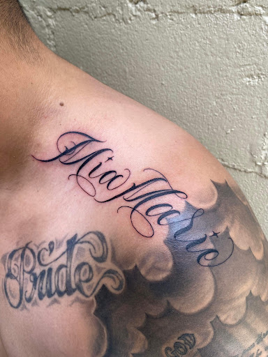 Explore mens wedding band tattoo ideas, creative tattoo ideas in Denver, available at The Elegant Elephant Tattoo