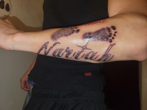 Explore sternum tattoo ideas for females, creative tattoo ideas in Fresno, available at Lil Ink Spot 559
