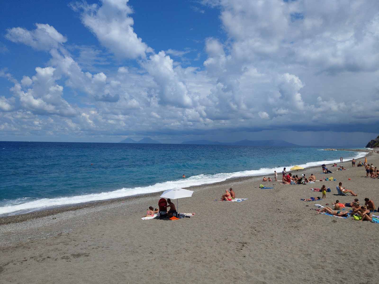 Foto av In Lucanna beach med turkos rent vatten yta