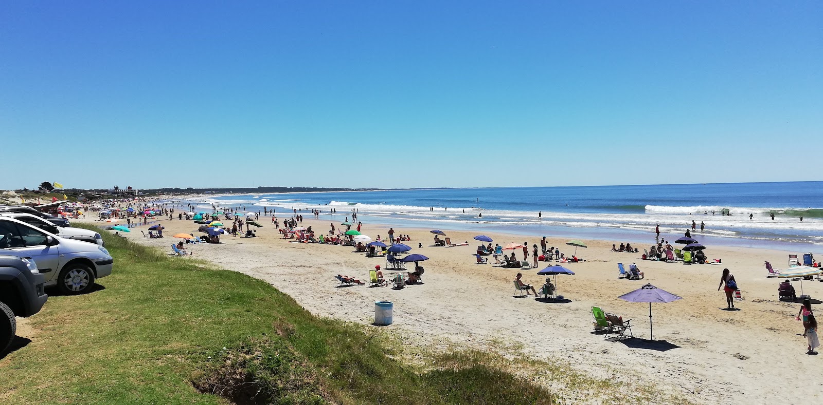 Foto di La Aguada Beach con una superficie del sabbia beige