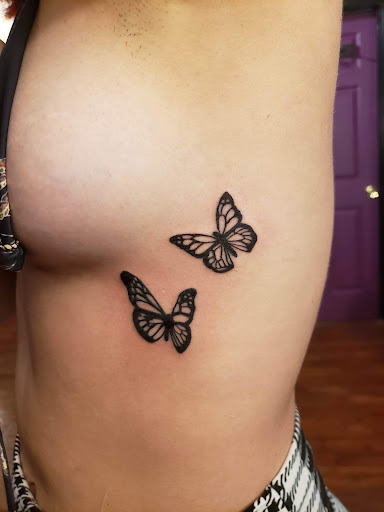 Explore tattoo ideas on ribs, creative tattoo ideas in Pahoa, available at Electric Jungle Tattoo