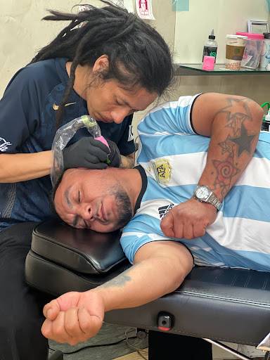 Explore peacock feather tattoo ideas, creative tattoo ideas in Astoria, available at Xolotl Tattoo Gallery