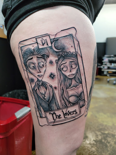 Explore book lovers tattoo ideas, creative tattoo ideas in Venice, available at Ministry of Ink Tattoo & Piercing