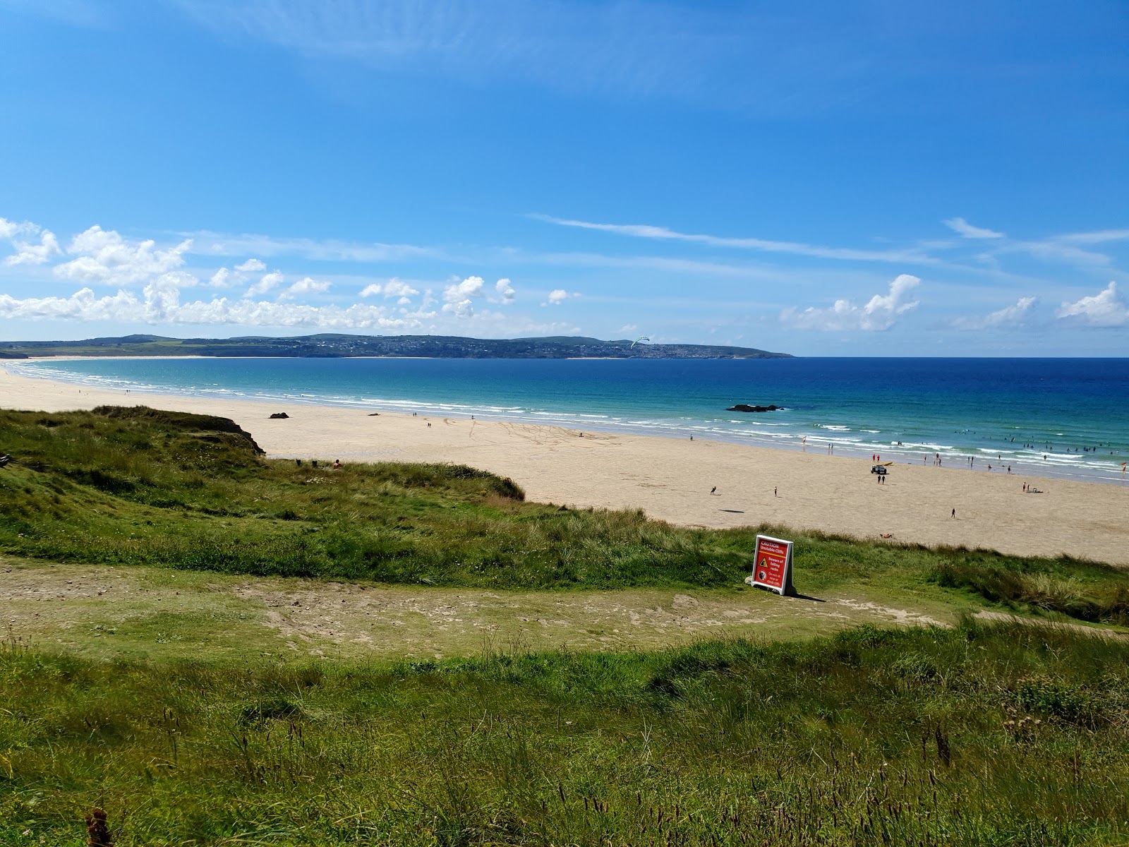Foto van Gwithian beach met recht en lang