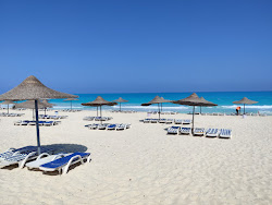 Foto von Horus Beach mit türkisfarbenes wasser Oberfläche