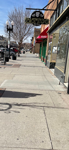 Explore upper arm men tattoo ideas, creative tattoo ideas in Ogden, available at Legacy Tattoo