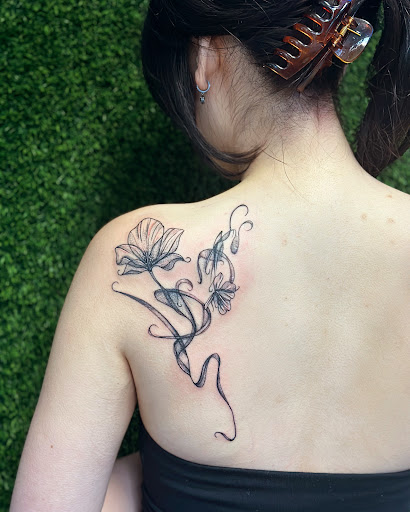 Find best female tattoo ideas for your next unique tattoo in Cocoa at Rorschach Tattoo Shop and Piercing Studio