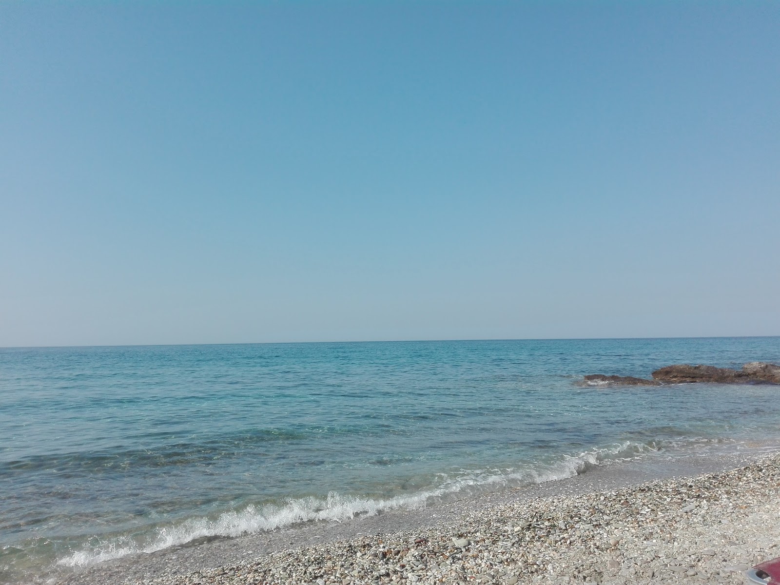 Foto von Ammoudeli beach und seine wunderschöne Landschaft