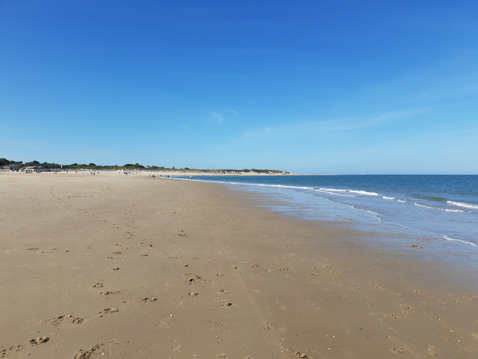 Foto van Banjaardstrand met beige zand oppervlakte