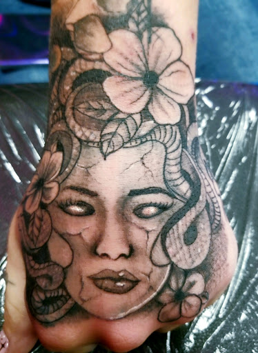 Explore small coraline tattoo ideas, creative tattoo ideas in Willis, available at Bizarres llc at Dirtles s Design Studio