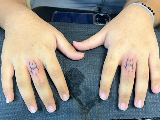 Explore ring tattoo cover up ideas, creative tattoo ideas in Houston, available at 333 Tattoo Studio HTX