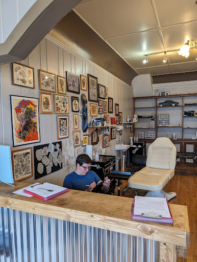 Explore floral tattoo filler ideas, creative tattoo ideas in Owosso, available at Crimson Tattoos